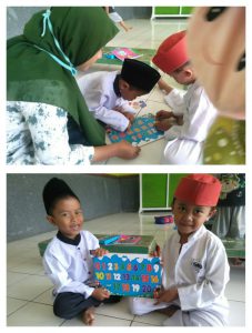 Hari ke 21 KKN-DR Kegiatan Bermain Puzzle Mencocokkan dan Menyusun Bersama Rika Rohmatul Fawaiz Mahasiswa Jurusan Pendidikan Islam Anak Usia Dini Fakultas Ilmu Tarbiyah dan Keguruan IAIN Syekh Nurjati Cirebon