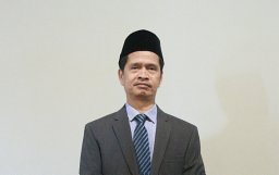 Prof. Dr. Hajam, M.Ag